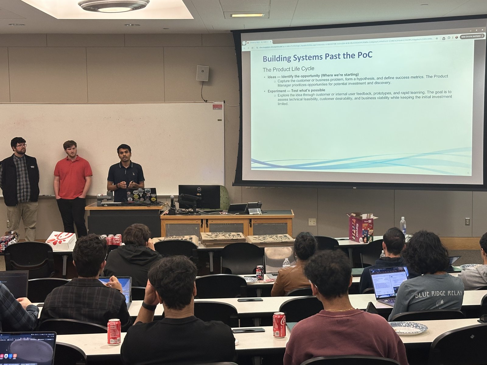 The three Direct Supply presenters at the front of the room