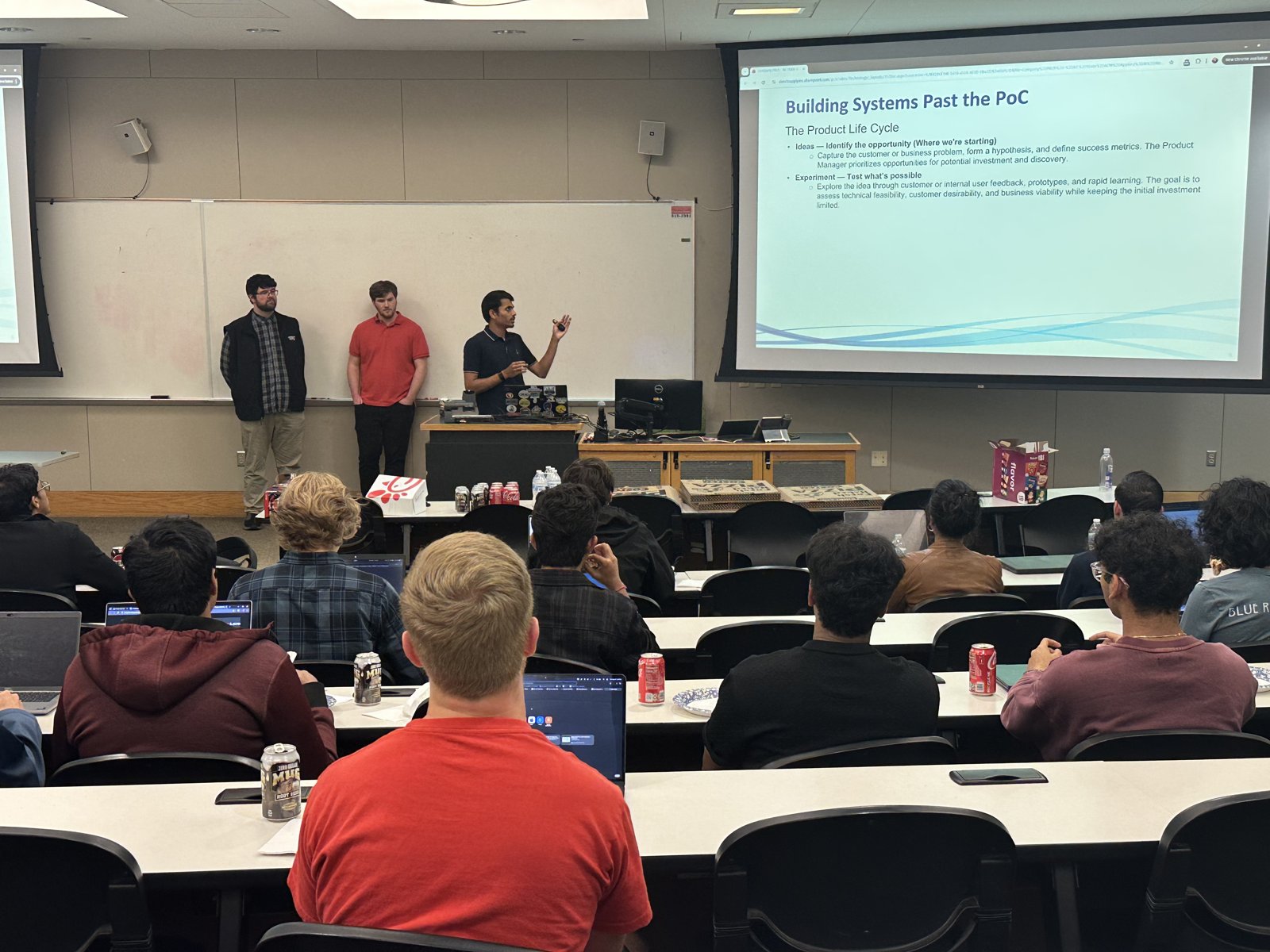 Direct Supply presenters explaining their slides at the AI workshop